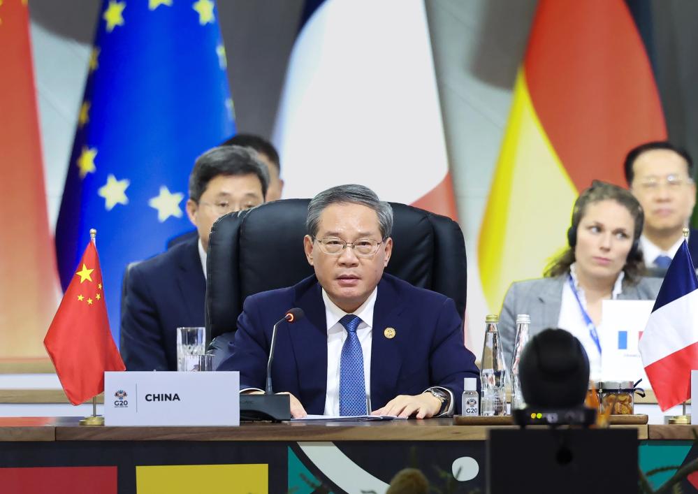 Chinese Premier Li Qiang addresses the third session of the 20th G20 Summit in Johannesburg, South Africa, Nov. 23, 2025. Li appealed for efforts of the G20 to strive for broader global cooperation to jointly cope with challenges and promote development. Li made the remarks when attending the second and third sessions of the 20th G20 Summit scheduled here for Saturday and Sunday. (Xinhua/Huang Jingwen)
